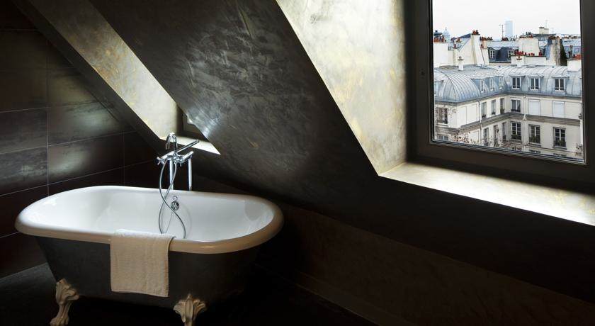 Habitación para parejas con bañera en el Hotel Original Paris