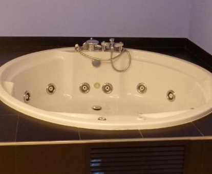 Foto de la bañera de hidromasaje en Casa Enea