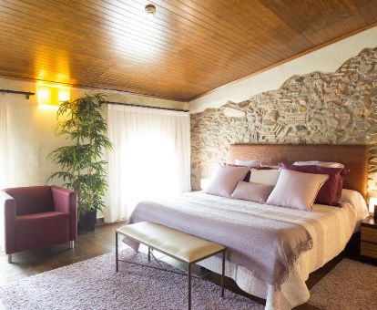 Una de las coquetas habitaciones de este romántico hotel ideal para parejas.