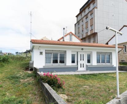 Foto de esta coqueta casa independiente con vistas al mar.