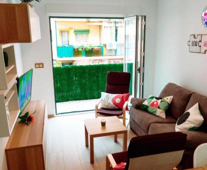 Foto del interior de este acogedor apartamento con terraza.