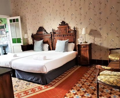 Una de las elegantes habitaciones de estilo clásico de este hotel romántico.