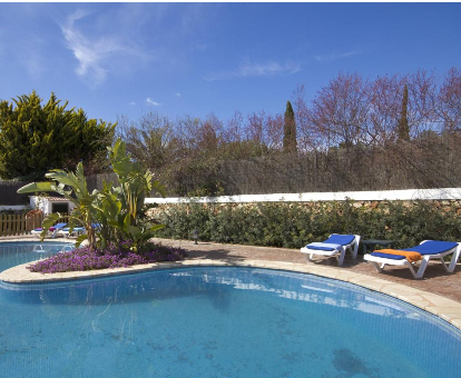 Piscina al aire libre de la Villa Angel en Son Xoriguer