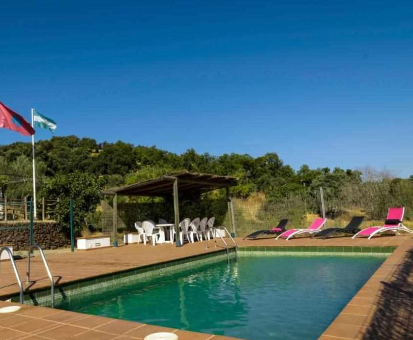 Piscina rectangular exterior de la Casa Rural Finca el Tornero en Aracena