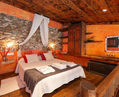 Una de las coquetas habitaciones de estilo tradicional de este hotel rural.