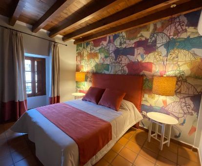 Una de las acogedoras habitaciones dobles de esta posada rural.