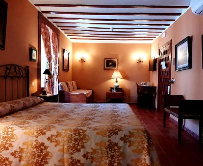 Una de las habitaciones de estilo tradicional de este hotel rural.